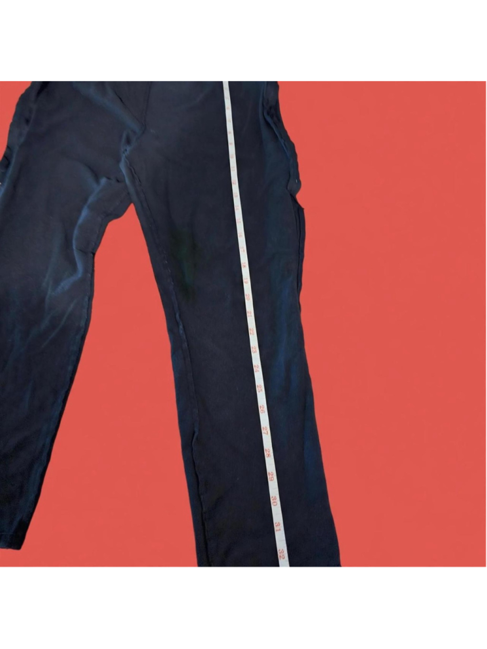 Black straight leg pants with a relaxed fit adaptation side zip hip